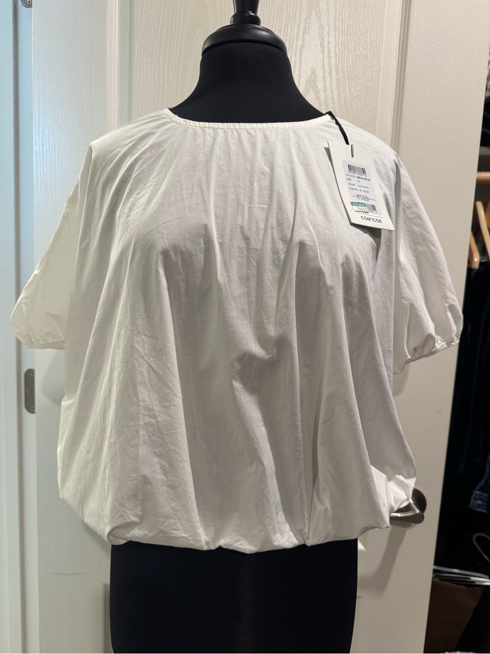 Women’s White Short-Sleeve Blouse - Relaxed Fit with stylish back.